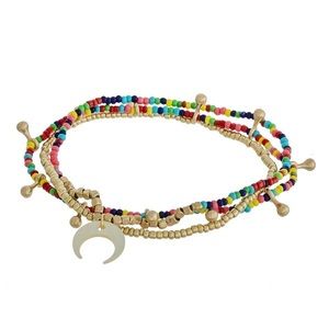 Bracelet set with gold accents and crescent detail